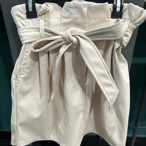 Brand new with tags! DO+BE Cream faux leather small skirt